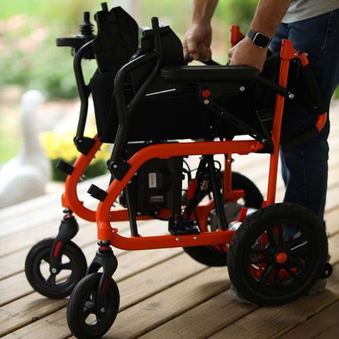 SuperHandy GoRide Folding Electric Wheelchair Being Folded View